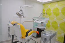 Advanced dental operatory with reclining chair, LED light, and treatment tools