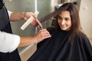 hairdresser with scissors cuts woman s hair hairdressing salon stylist client hairsalon beauty business professional service 1