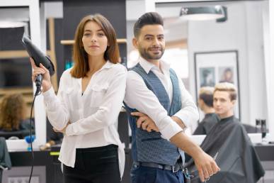 two hairstylers posing standing modern spacy beaty salon 1